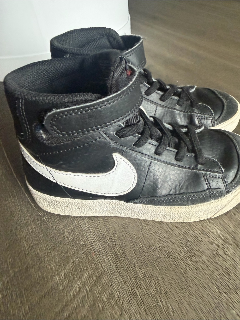 Nike Kids Black High-Top Sneakers with White Swoosh Accent